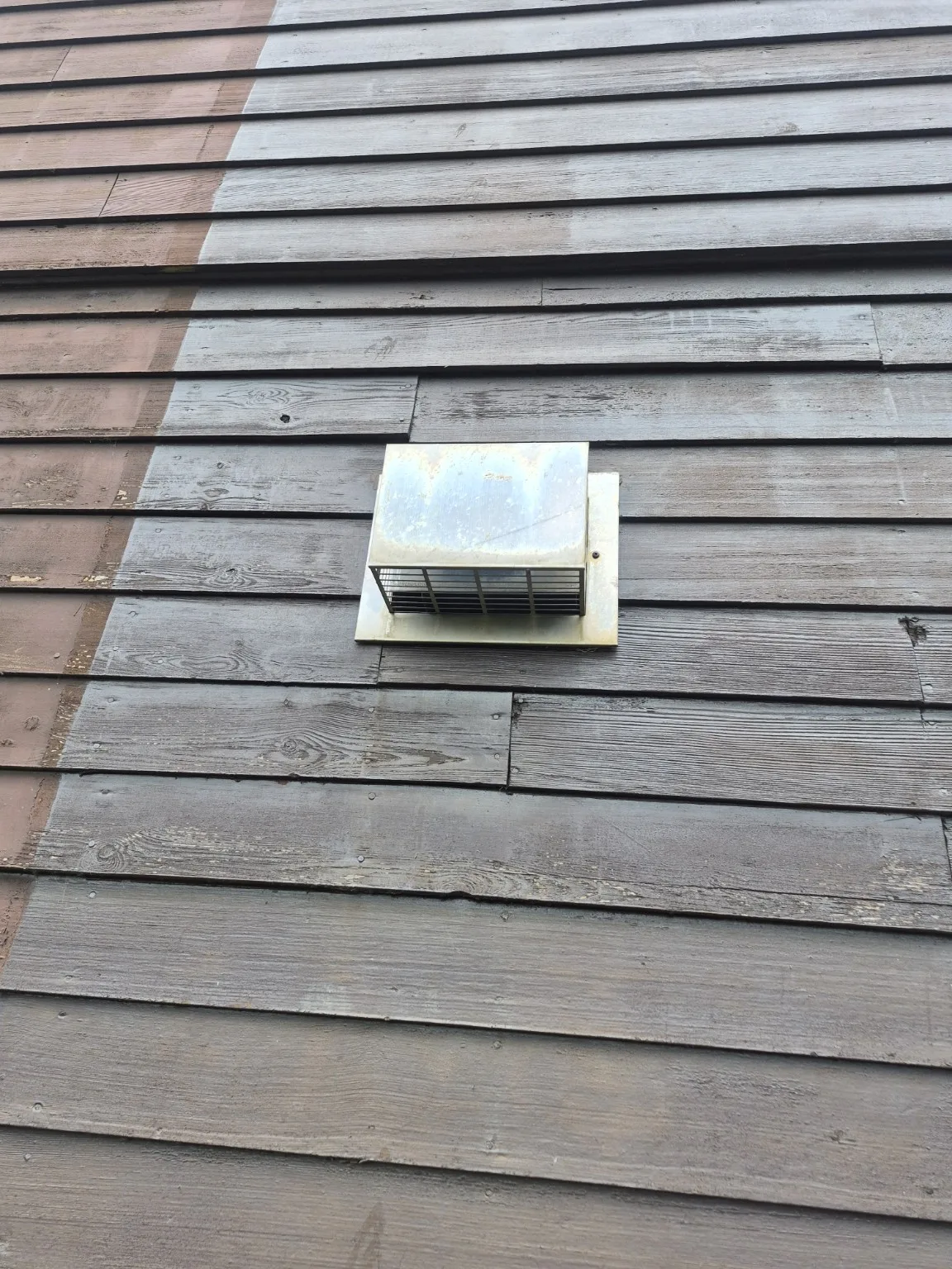 External flue terminal checked during an Ideal RS230 boiler service