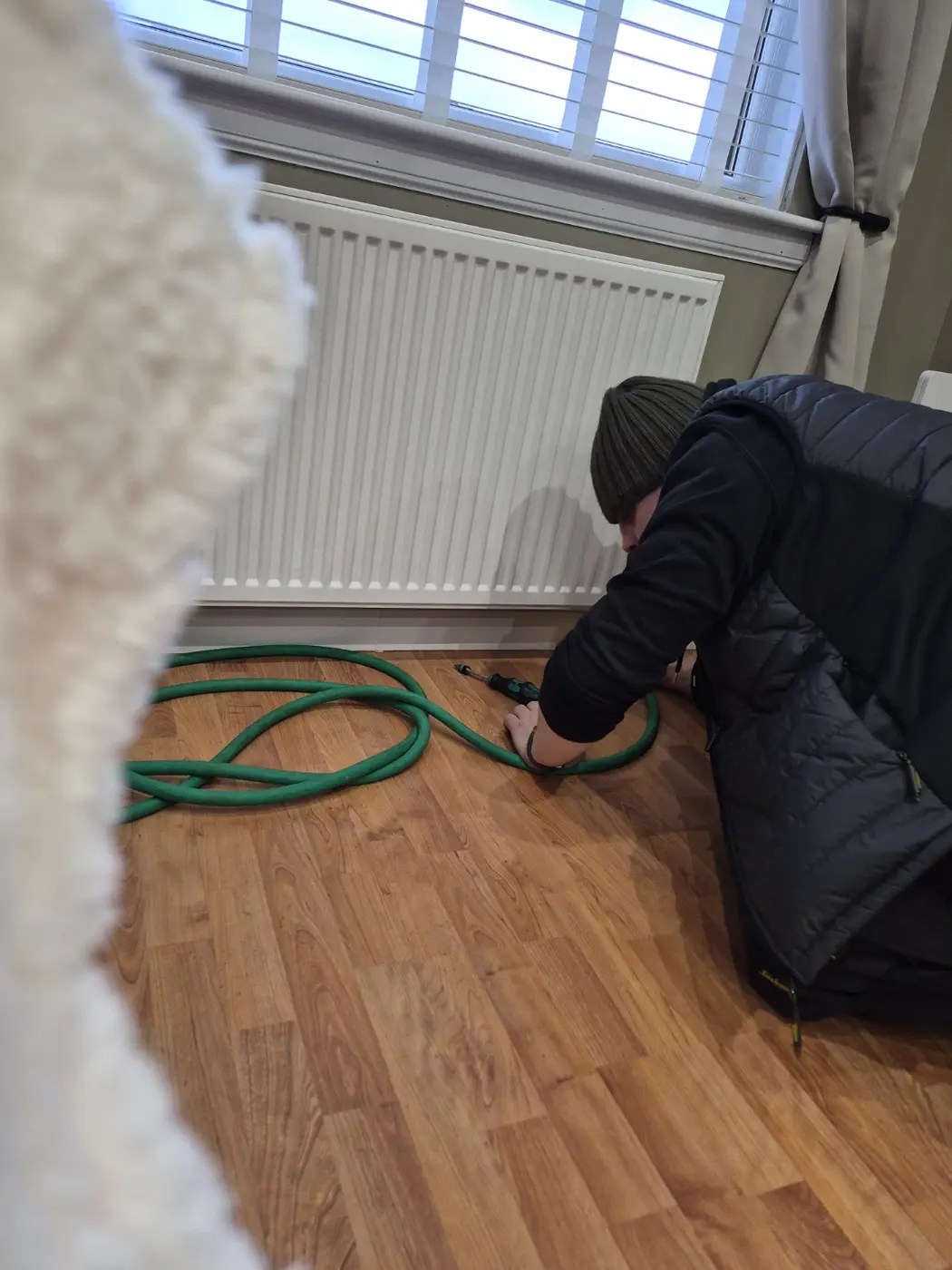 Craig carrying out radiator and heating work in a customer’s home