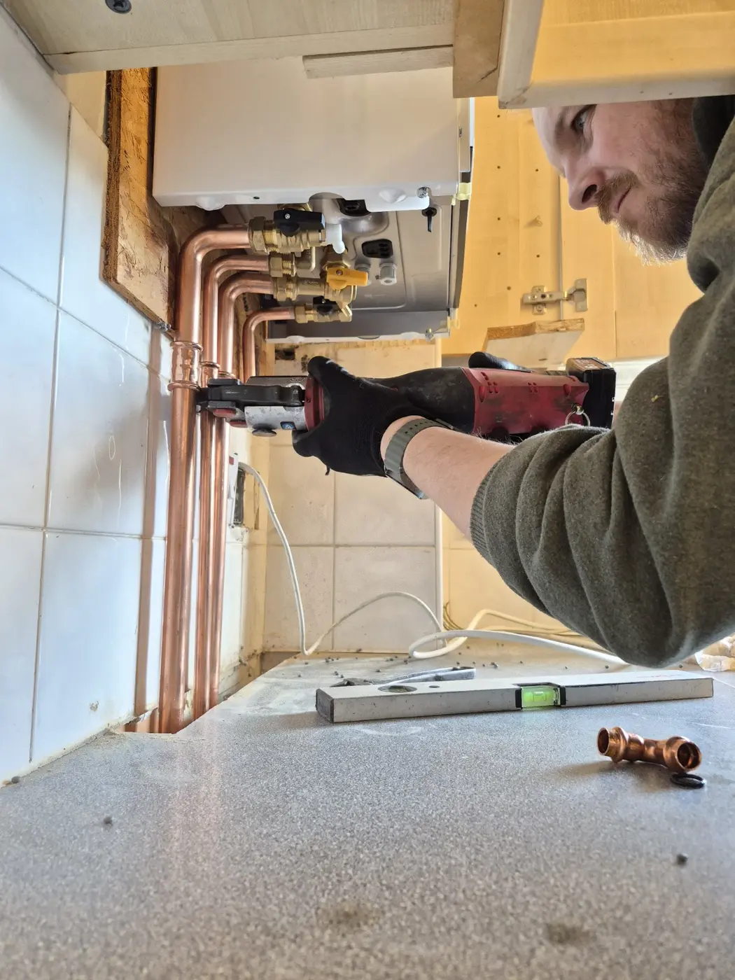 New copper pipework being installed neatly