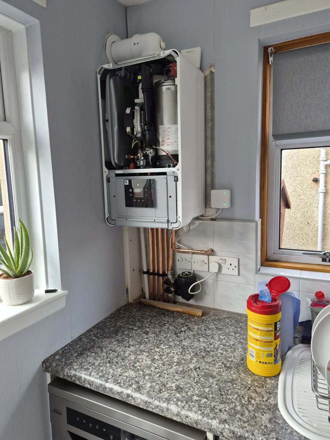 Open boiler inspected in a domestic kitchen